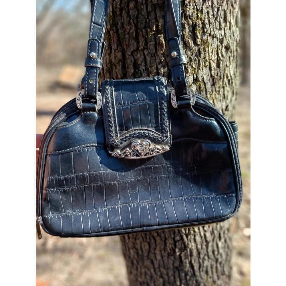M.C. Handbag